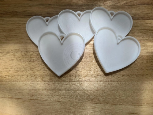 Plaquita corazon 4,4cm 5 unidades