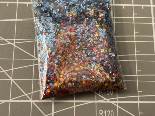 Glitter 5grs Dorado con rojo y azul 